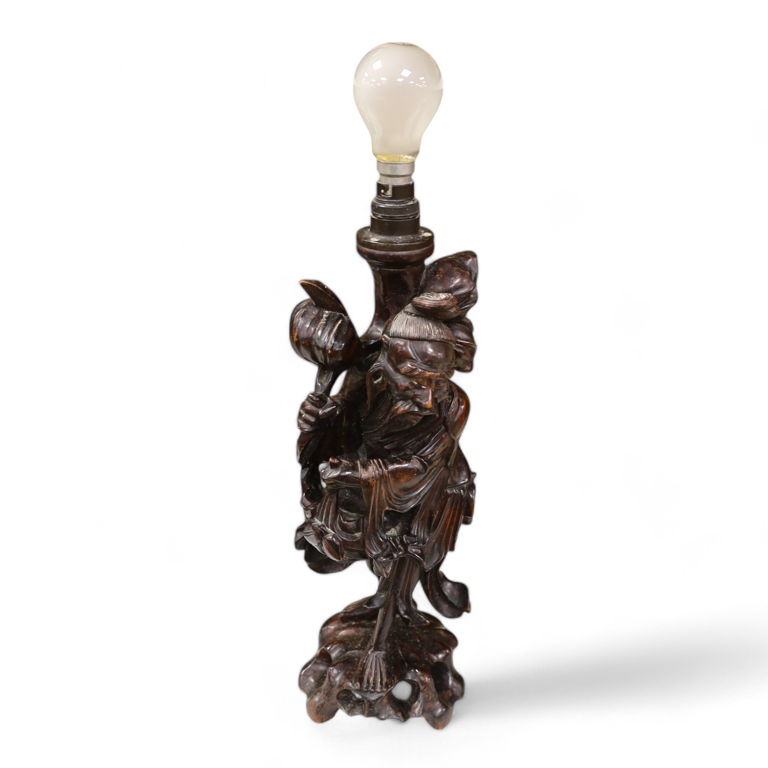 A Chinese carved wooden figural table lamp base, 36cm high not including light fitting. Condition - rubbed in places